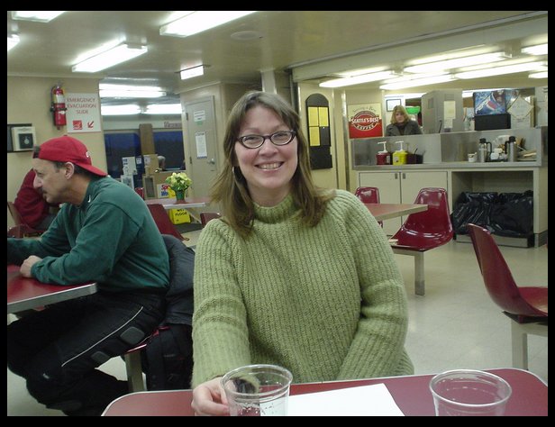 Lisa Paquin drinking on the boat