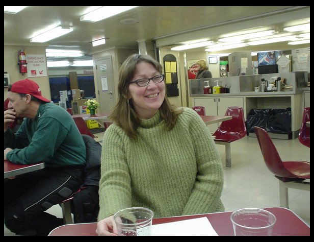 Lisa Paquin drinking on the boat