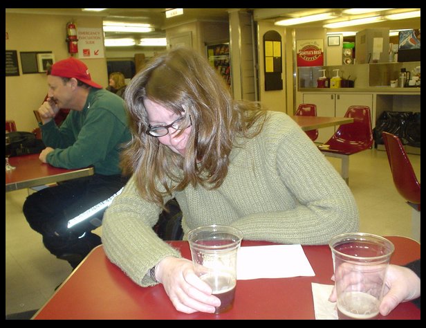 Lisa Paquin drinking on the boat