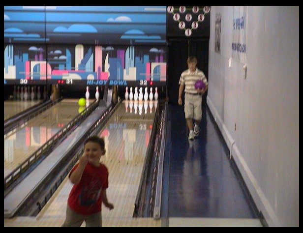 Logan giving the Yes sign for his bowling ability.
