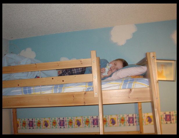 Logan and his new loft bed