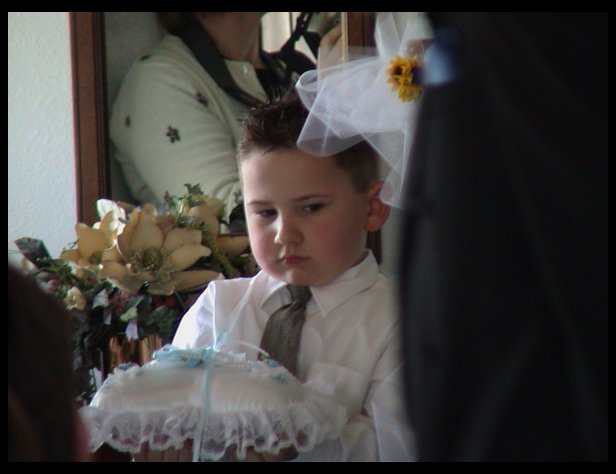 Logan as ringbearer for Jen & Jacobs wedding.