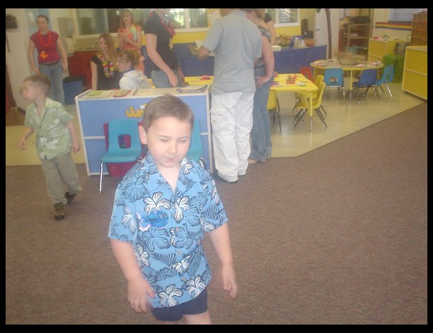 Logan at pre-school graduation from Wee Wolves.